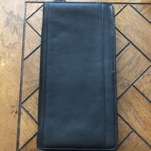 Tumi zip around black travel wallet